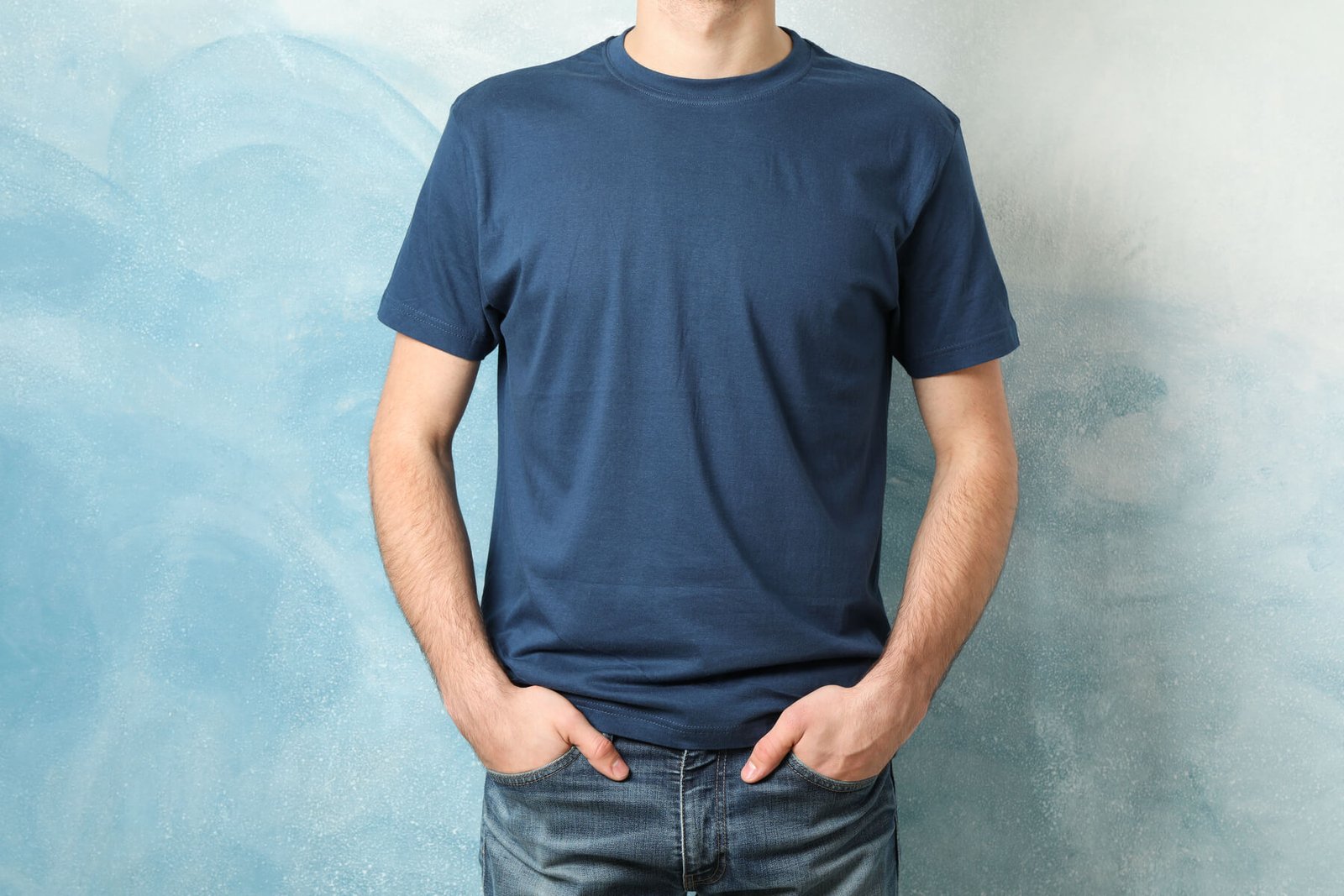 men in blank blue t shirt against color background 2023 11 27 05 08 47 utc.jpg